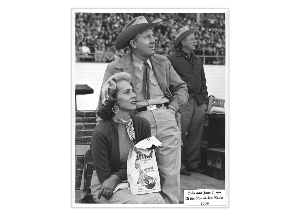 This is a black-and-white photo of Jane and John Justin at the 1954 Puyallup, Washington rodeo. 